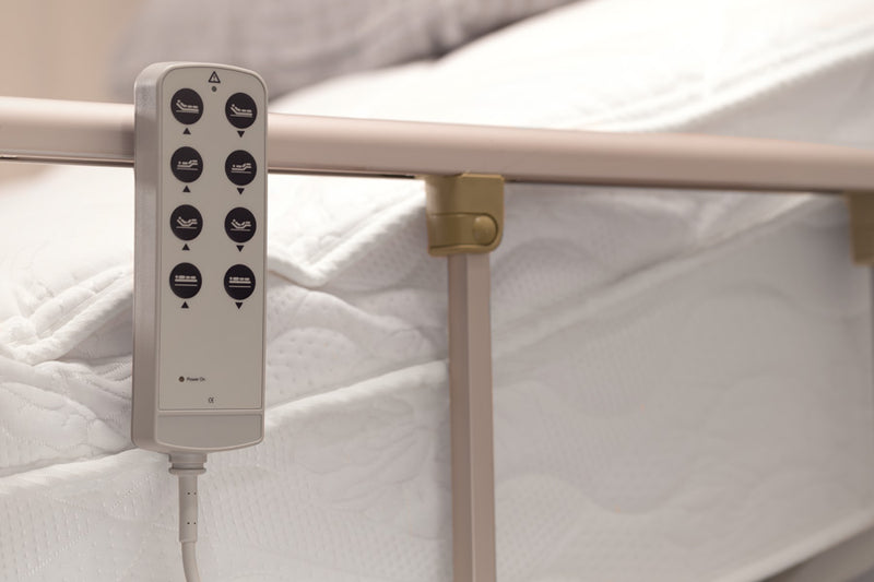 Adjustable Electric Bed Controller Attached To Bed.